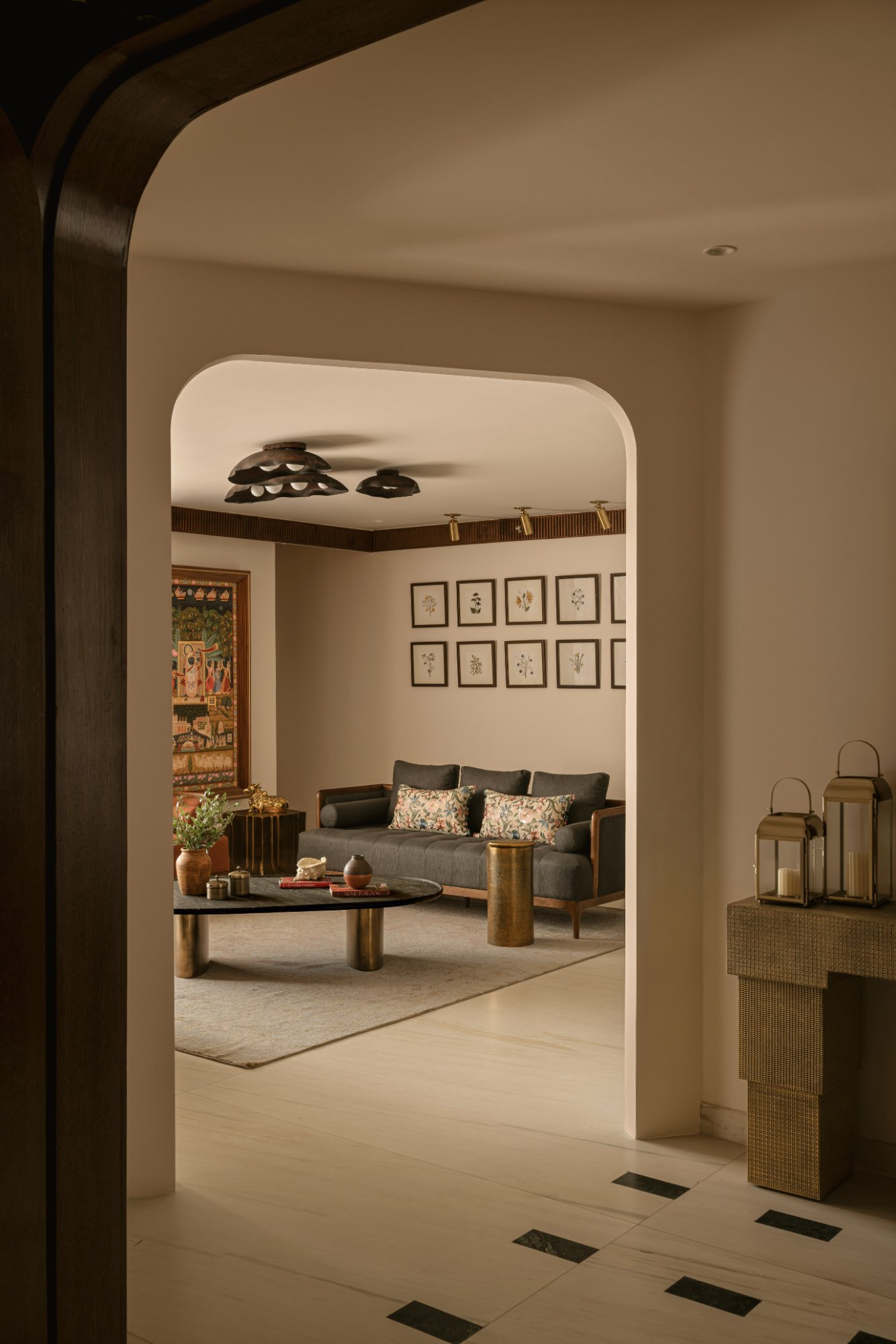 Arched opening framing the living room beyond the foyer