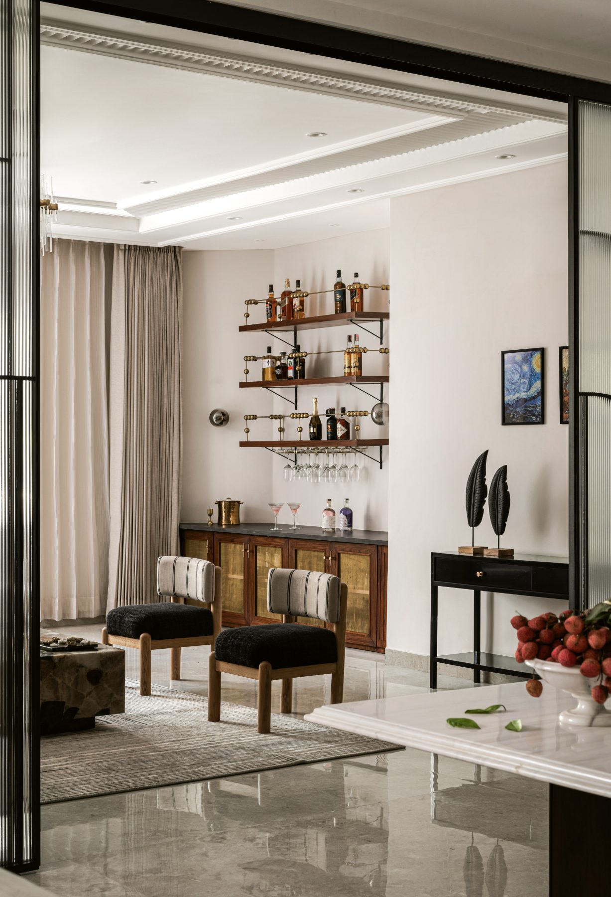 Brass and wood bar with backlit shelving