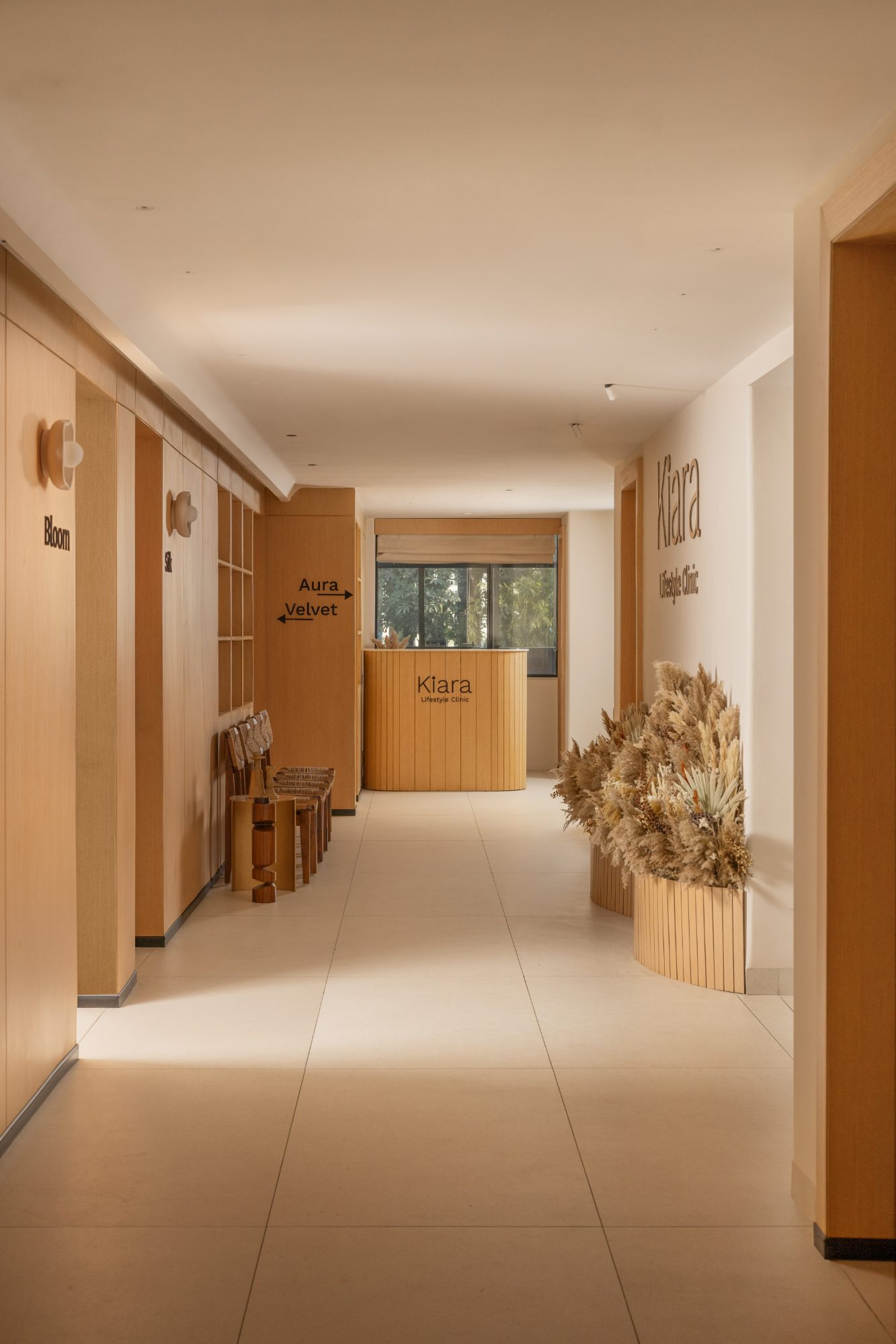 Oak corridor with dried botanicals and a window at the end