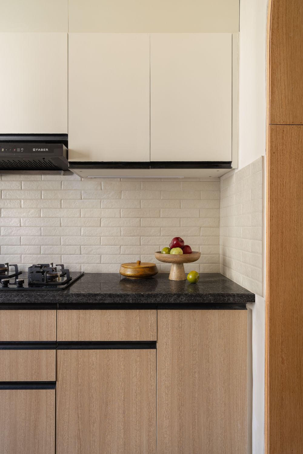 Kitchen counter detail with granite top and fruit bowl